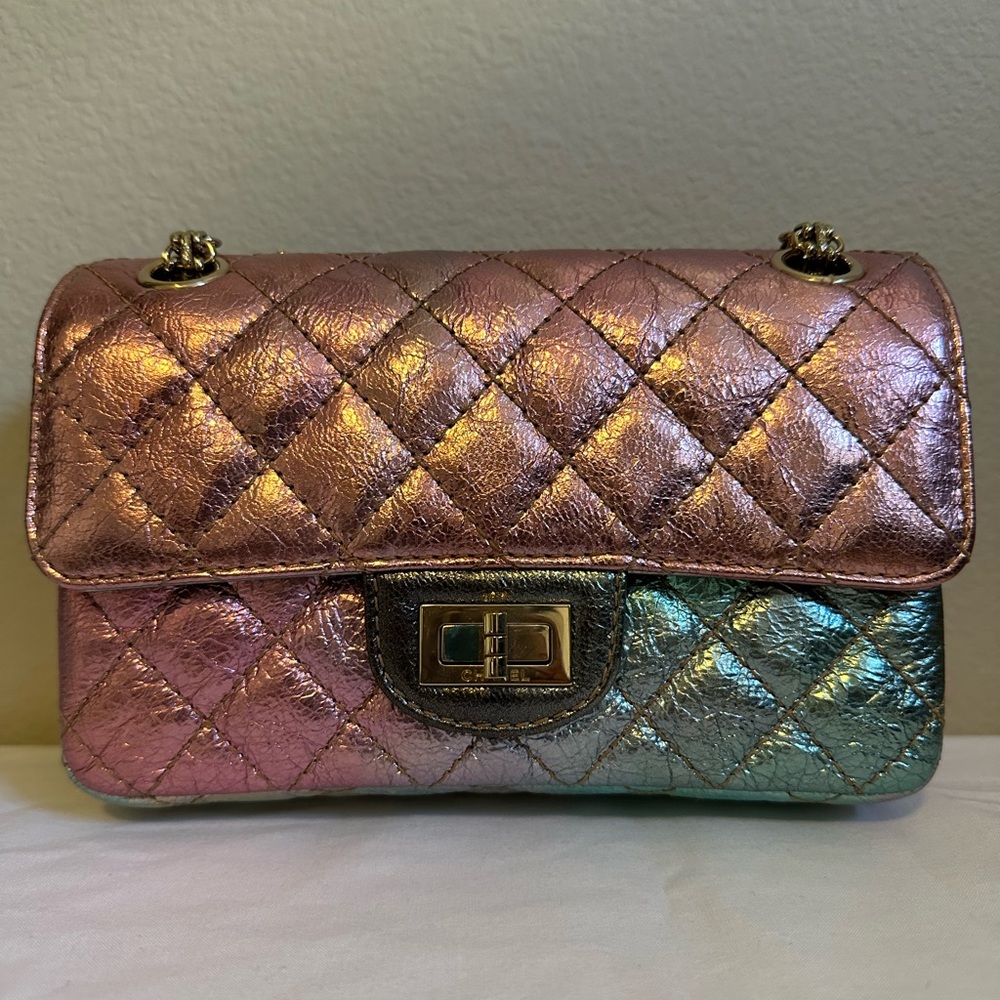 CHANEL
Metallic Rainbow Quilted Goatskin Leather 2.55 Reissue Mini Flap Bag